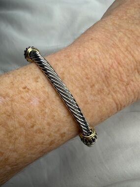 Two toned bangle bracelet with rodium plated accents